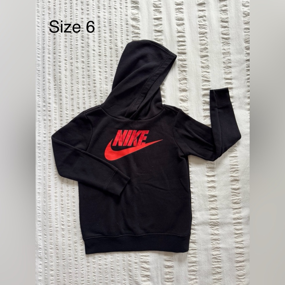 Nike Kids Black Hoodie with Bold Red Swoosh - size 6